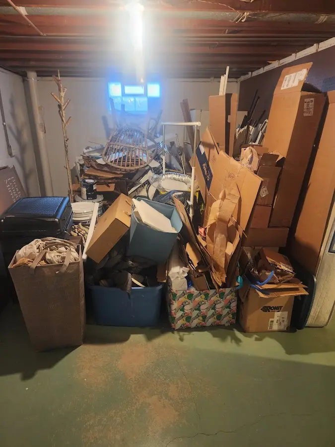 Roll-off dumpster container at job site for Construction Dumpster Rental in West Linn